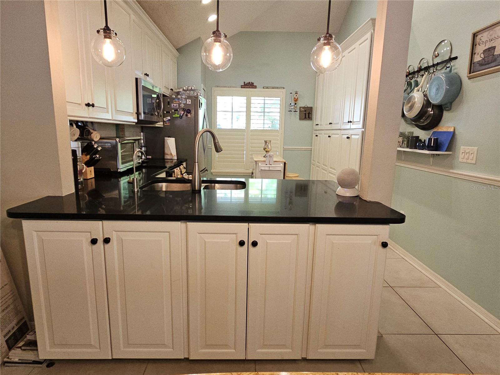 Kitchen Island Granite Counters & Cabinetry