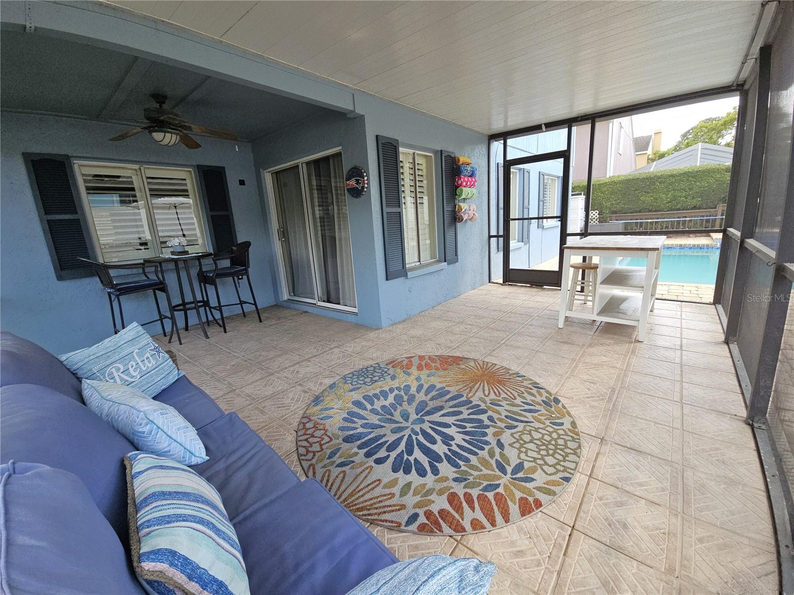 Screened in under-roof Patio w/Tile flooring