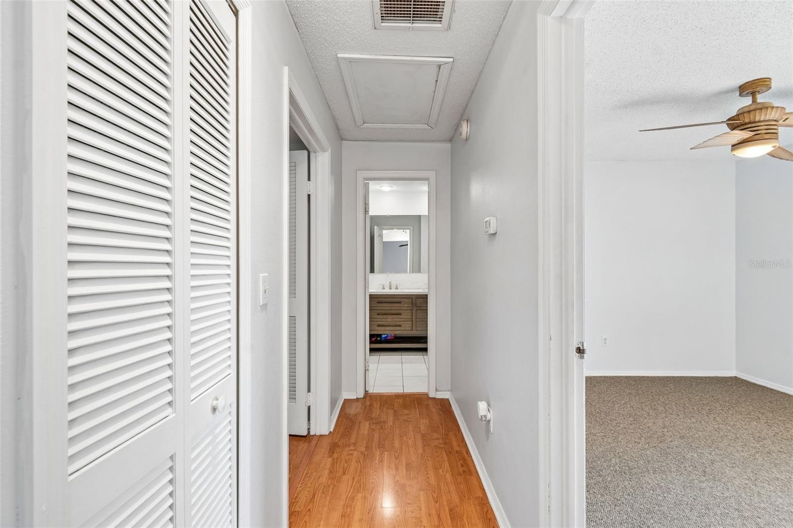 Hallway to other 2 bedrooms