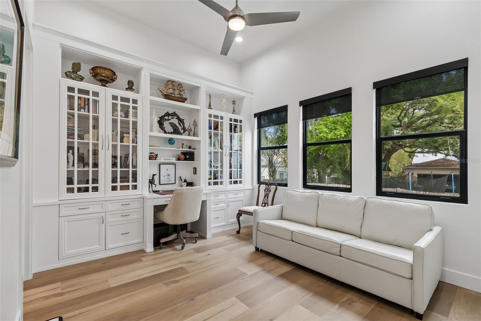 Downstairs 4th bedroom and full bath is currently used as an office with built-ins!