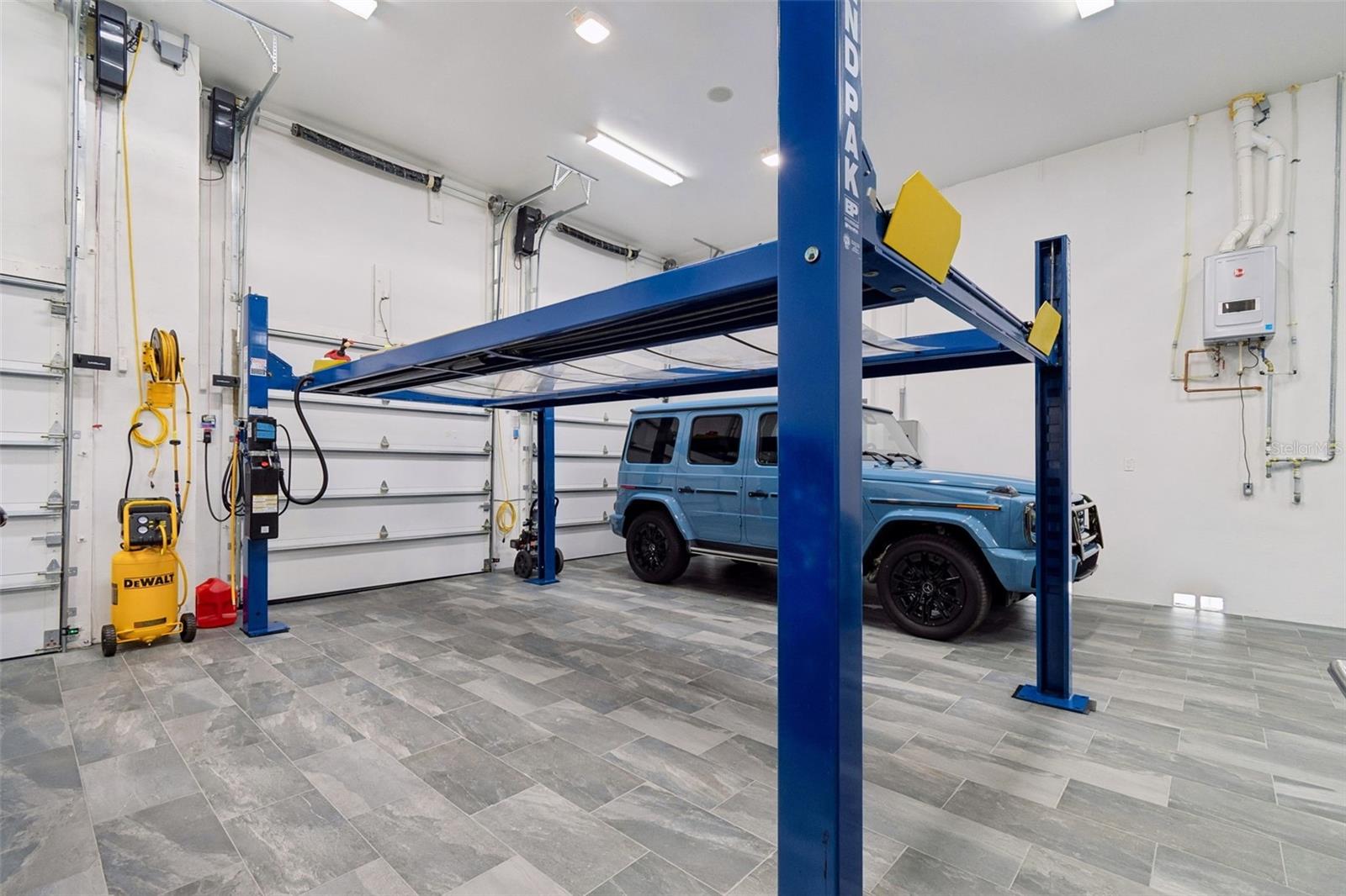 15 foot ceilings, EV charging station and workshop!