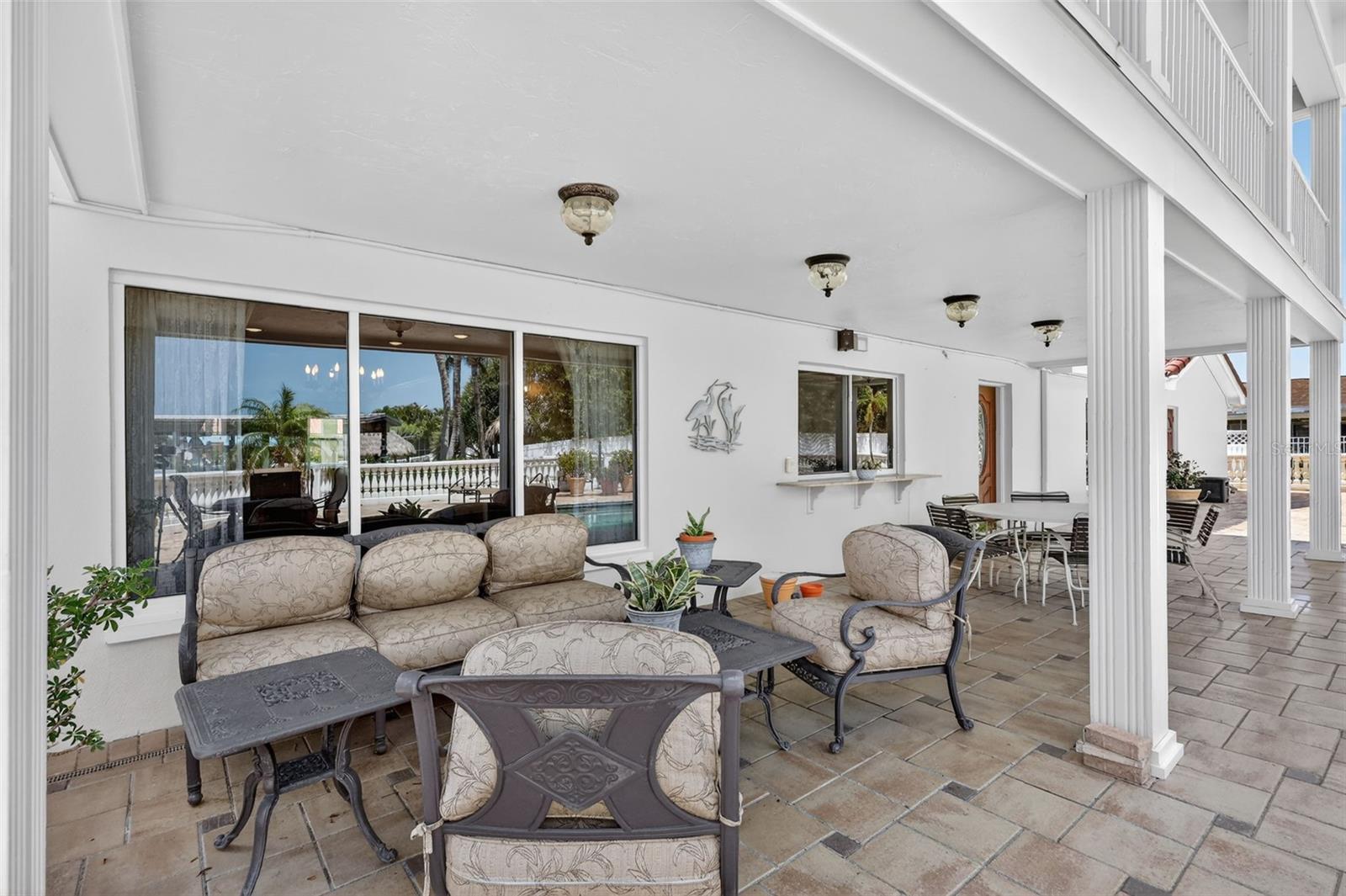 Covered patio area near the pool