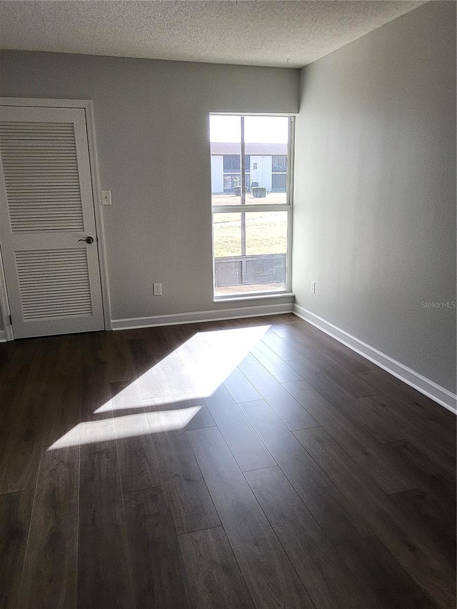 Bedroom with walk in closet