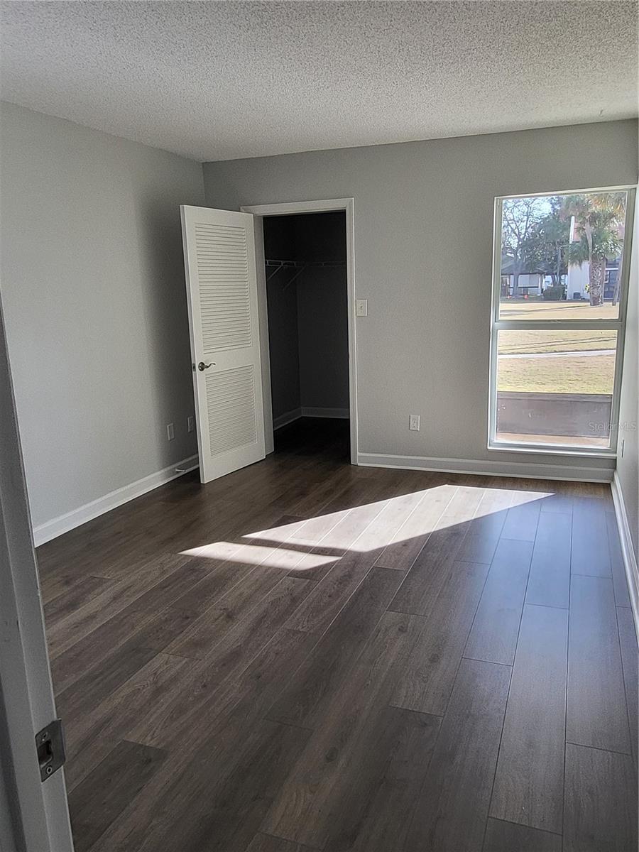 Bedroom with walk in closet