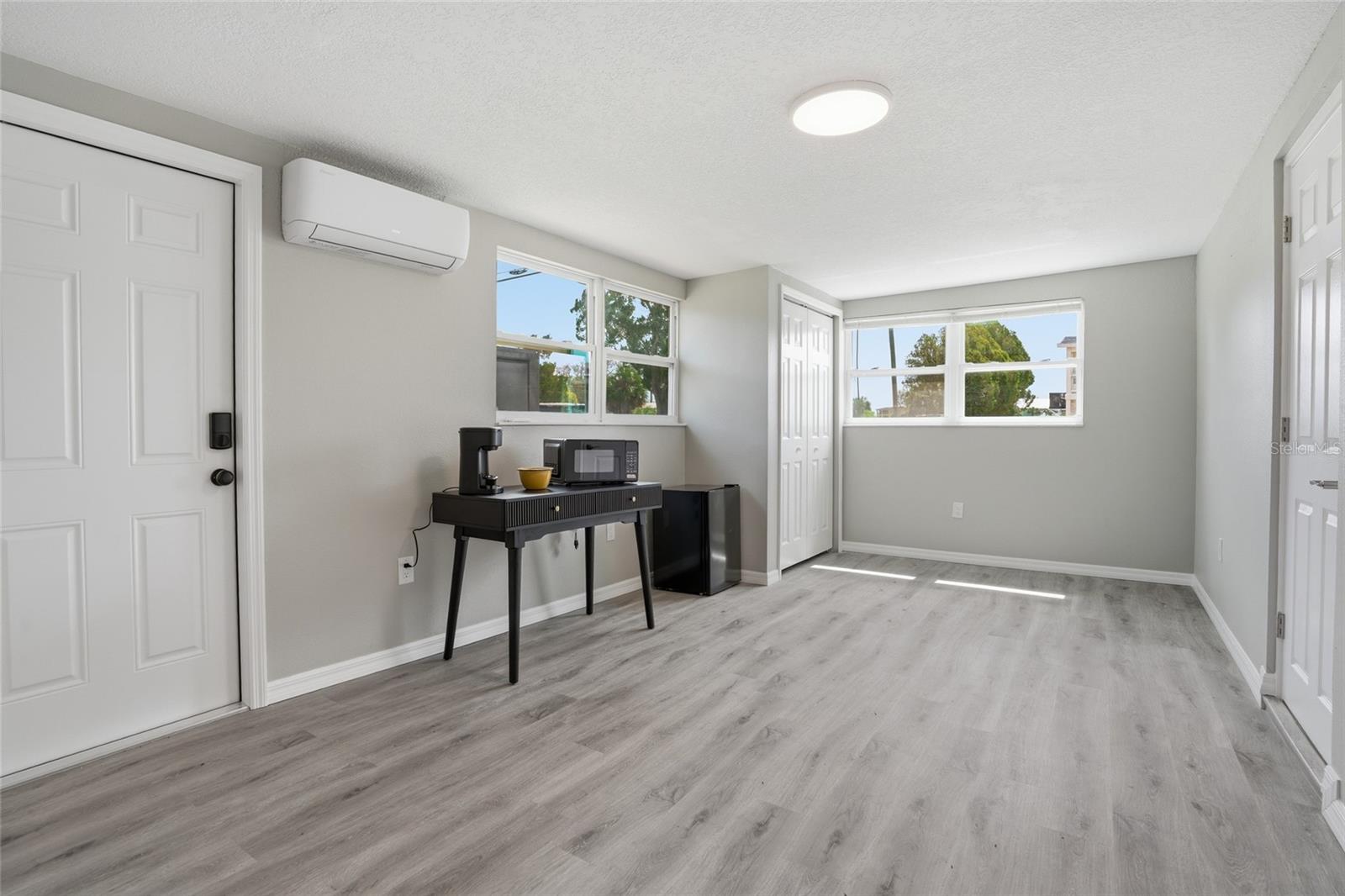 primary bedroom or one bedroom one bath unit with kitchenette