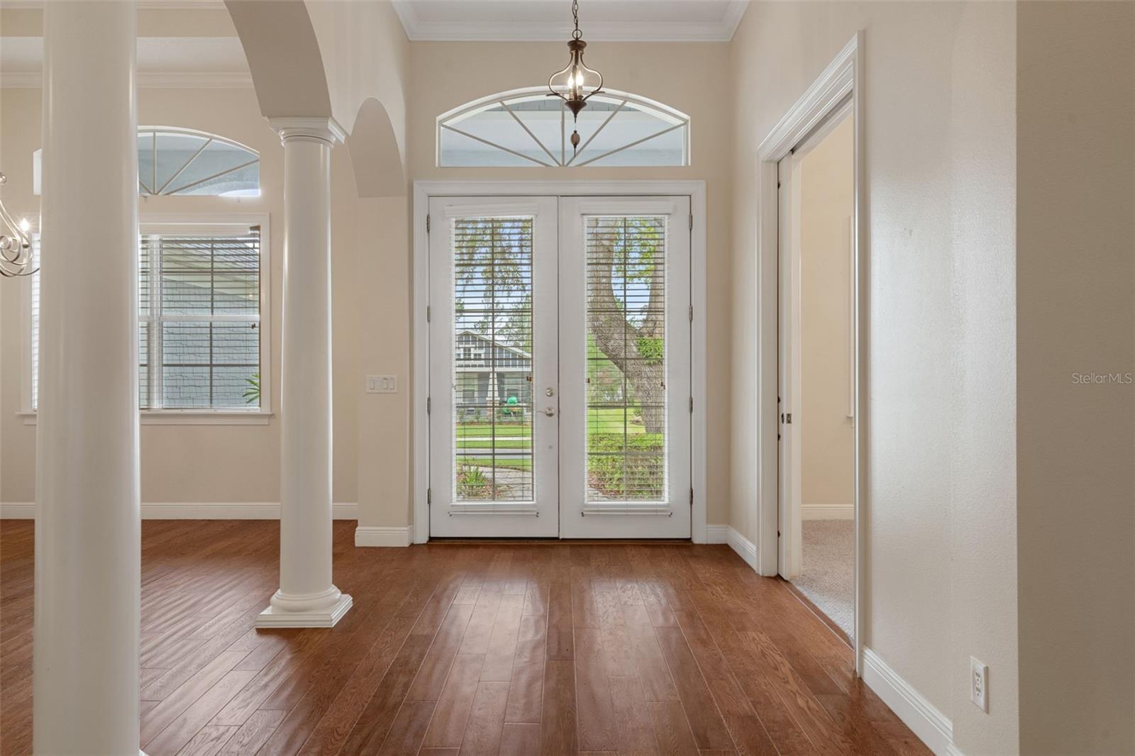 Inside Foyer with Hardwood Floors