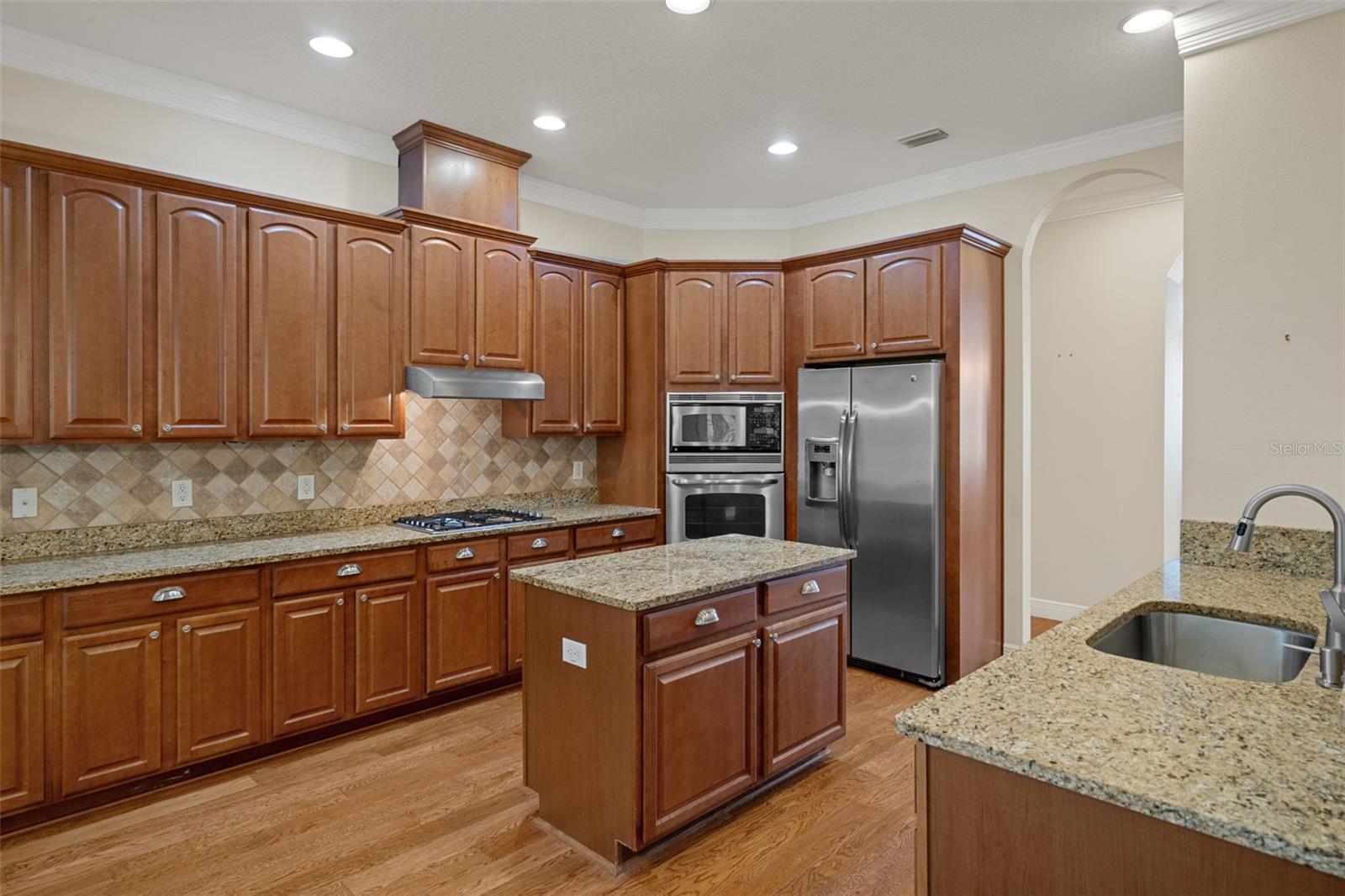 Kitchen with Stainless Steel Appliances and Gas Range