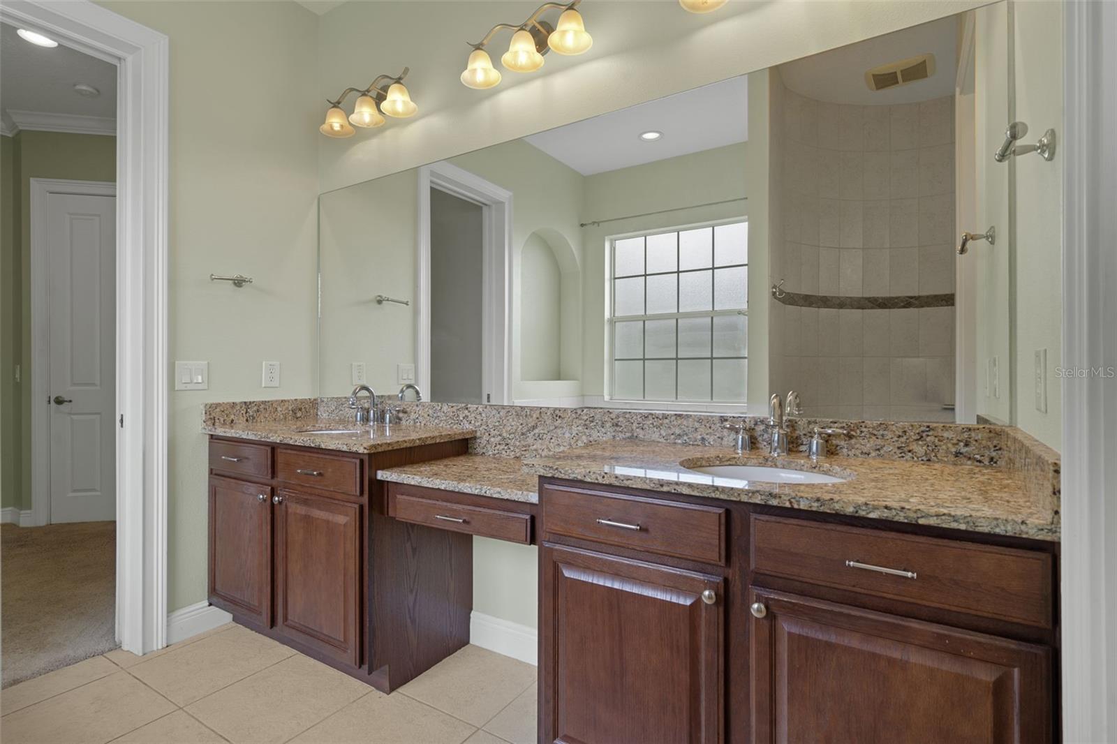 Primary Bath with Granite Vanity and Double Sinks