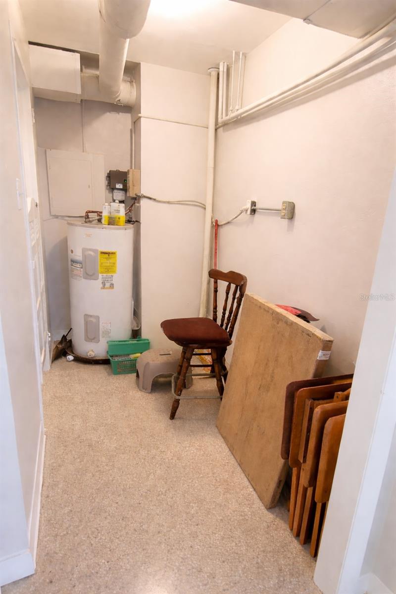 Laundry storage area in the condo