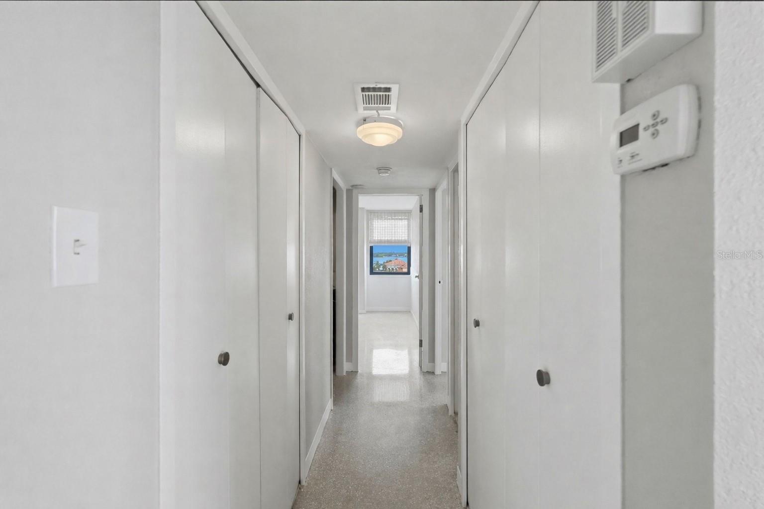 Hallway area - closets on both sides plenty of storage