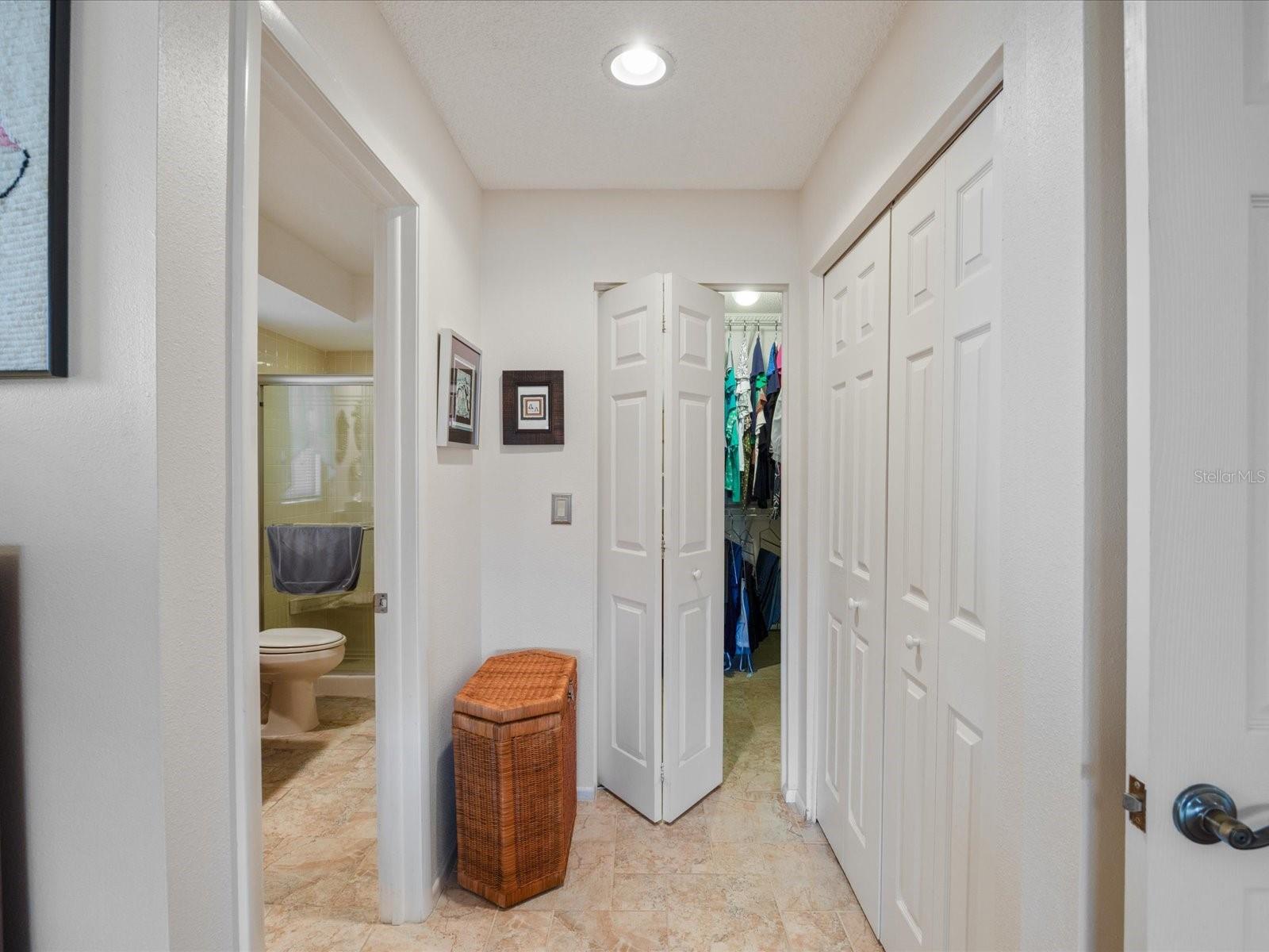 Large walk-in closet with additional built-in closet