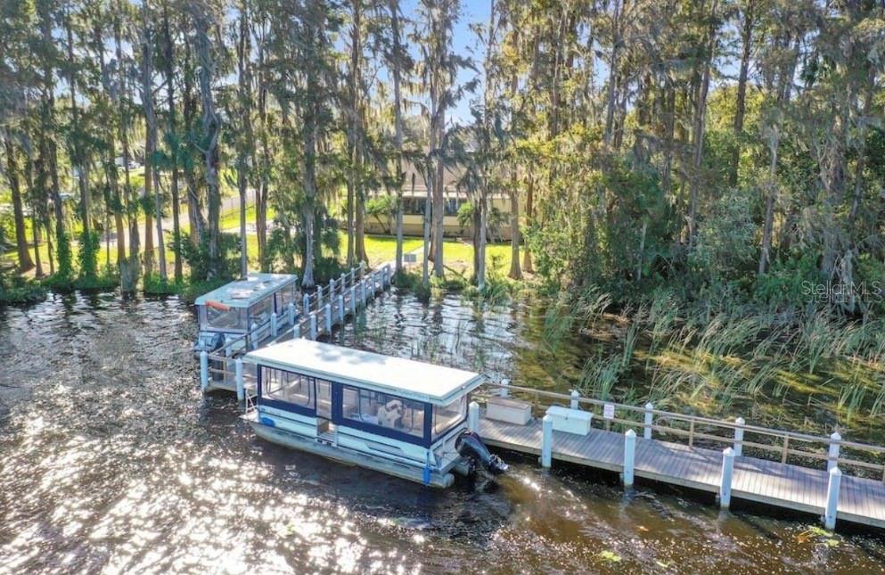 2 community pontoon boats for cruising the lake