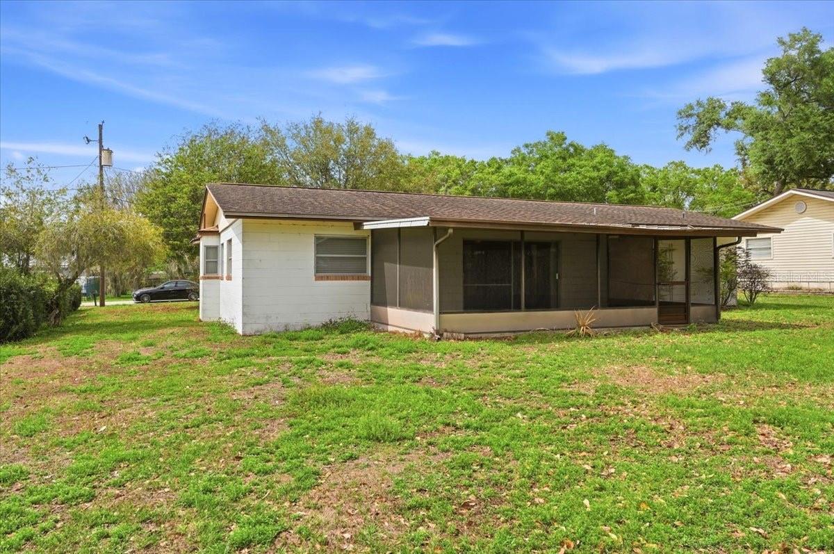 rear of home with nice scr patio