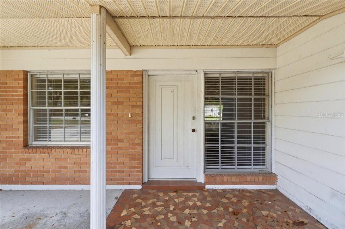 covered front porch leading to front door