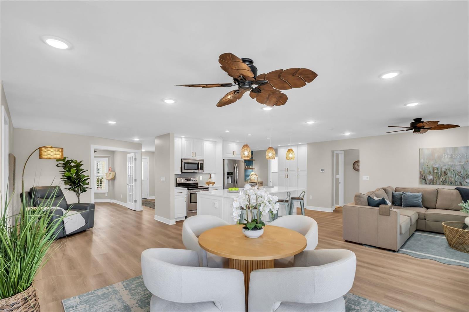NEW luxury vinyl plank flooring, not a SPECK of popcorn ceiling, and recessed lighting throughout~