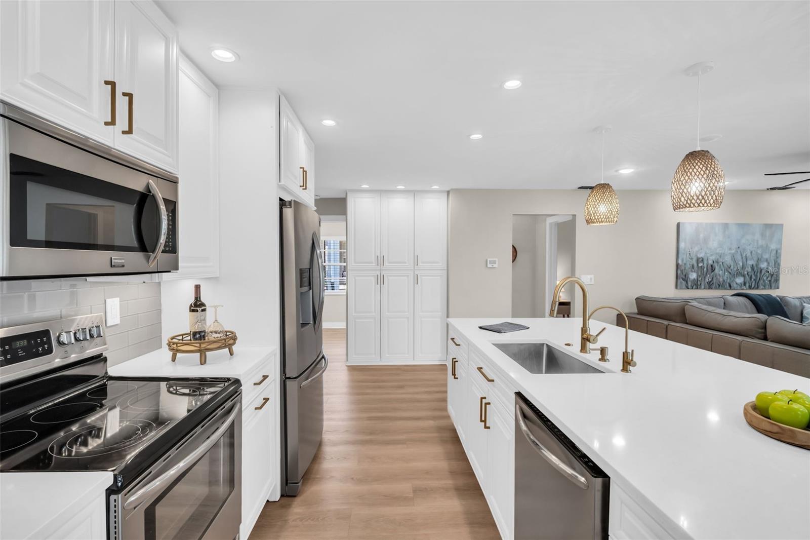 Abundant custom solid-wood cabinetry~