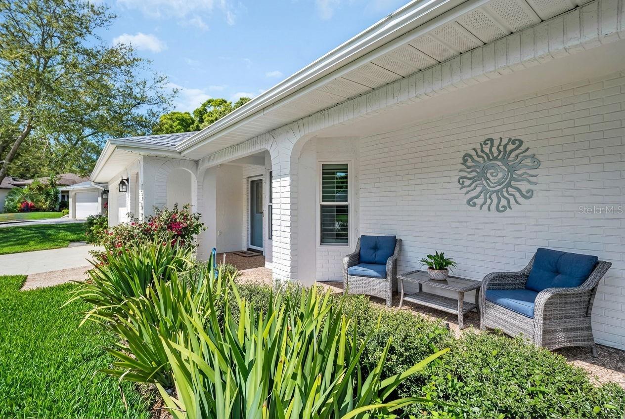 Gracious covered front entry & patio~