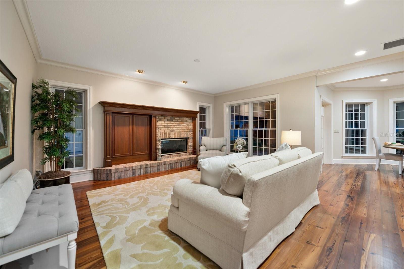 Family room has a gas fireplace and opens to the dinette.