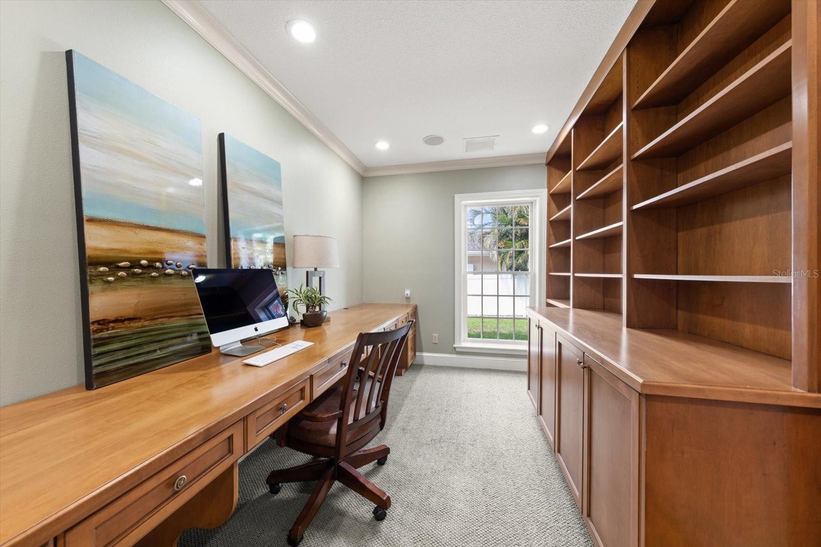 Office with notable work area space and built-ins that are appreciated!