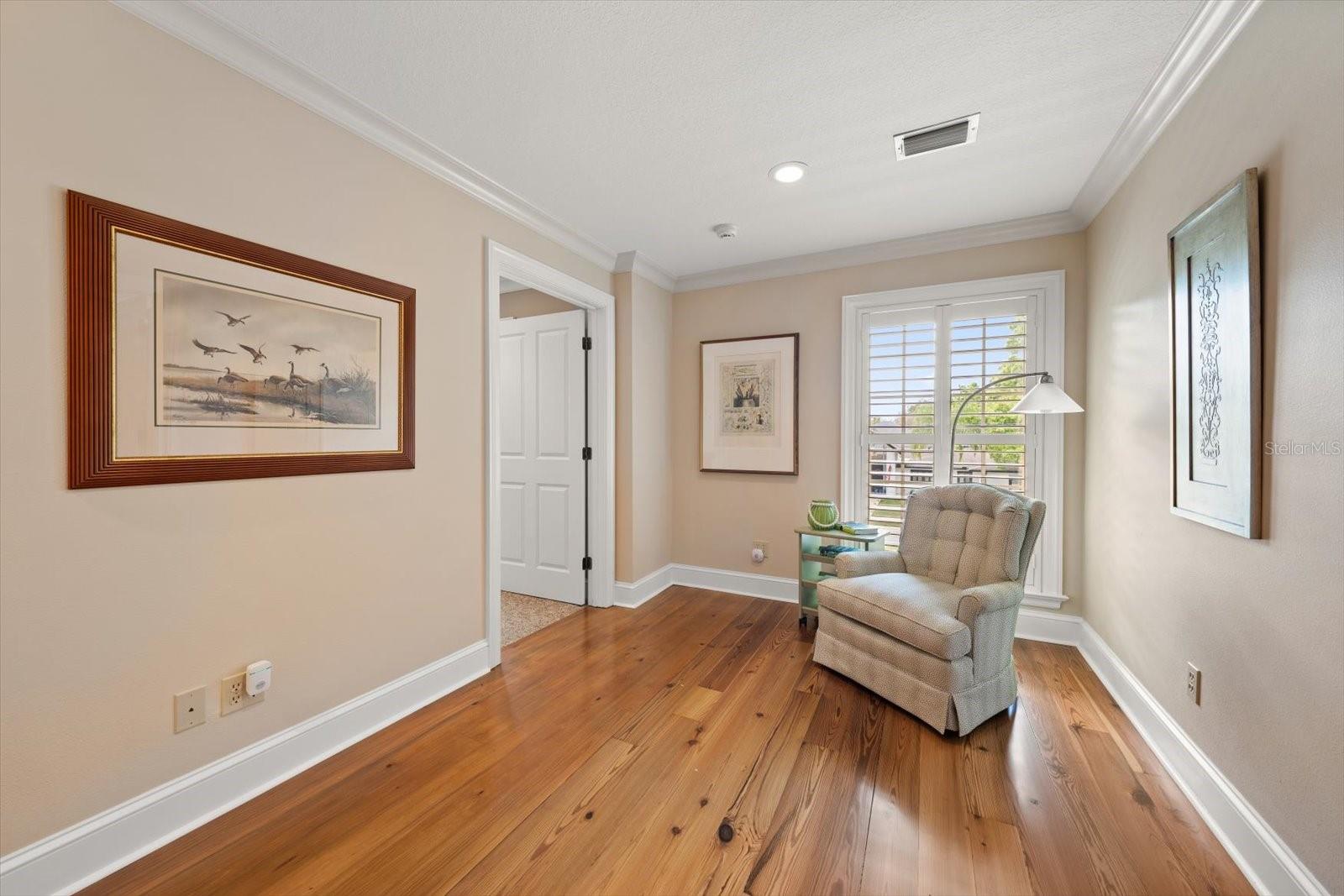 Second floor hallway is wide and offers additional space for versatile use.