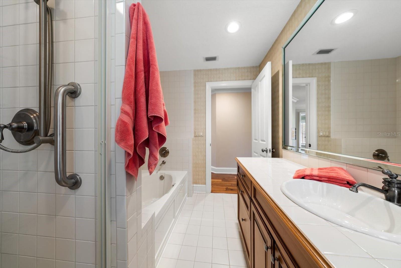 General bath on second level with soaking tub and walk in shower.