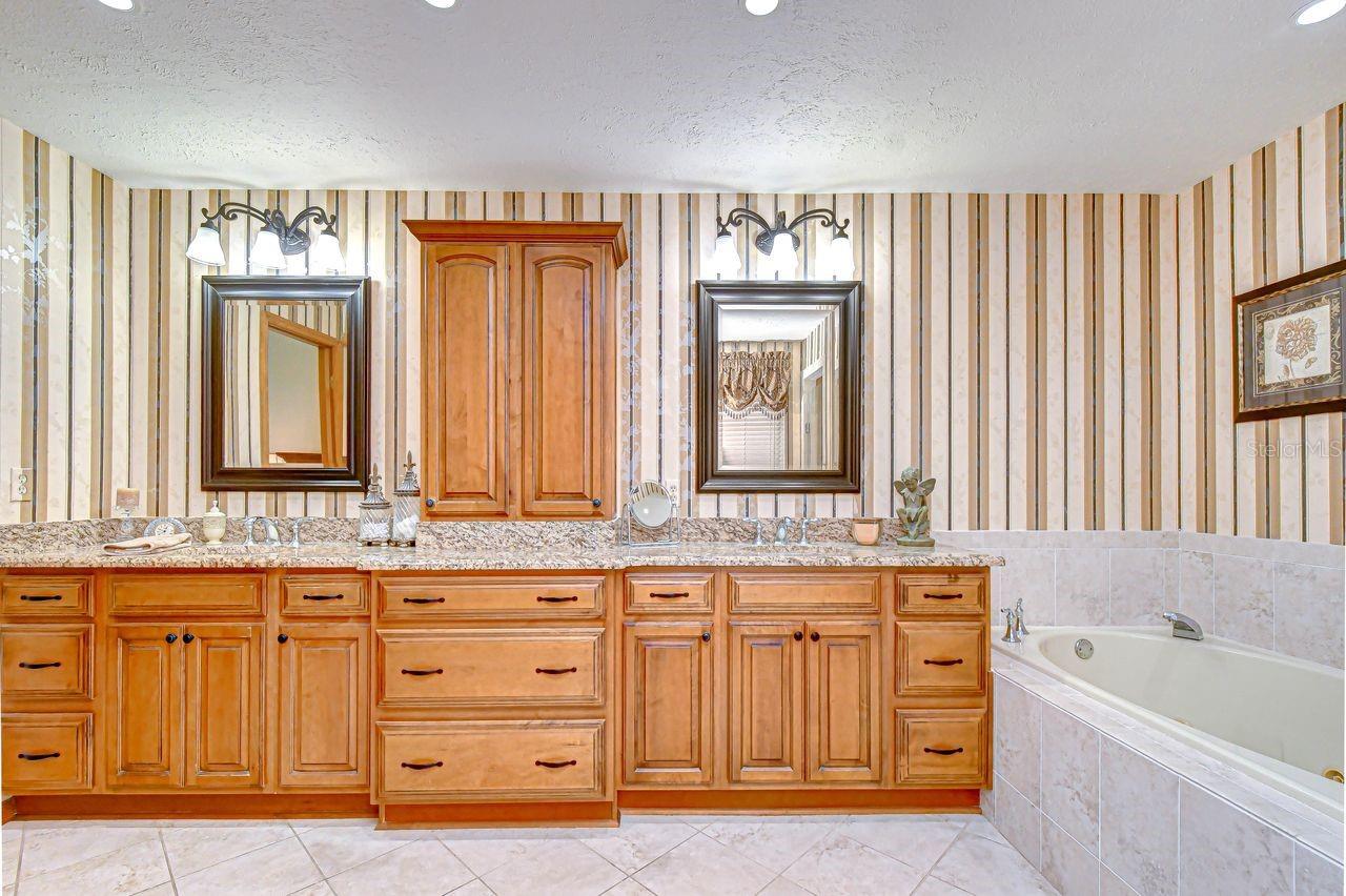 Primary Bathroom with upgraded wood cabinets