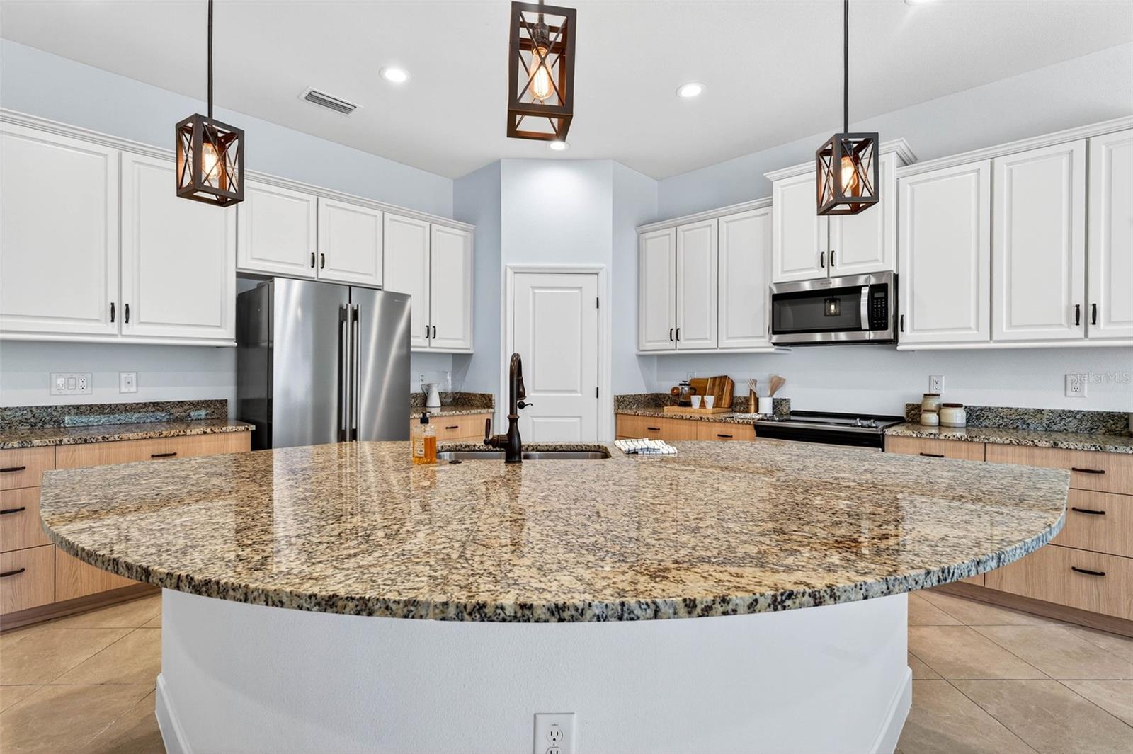 Granite countertops, new fridge, closet pantry.