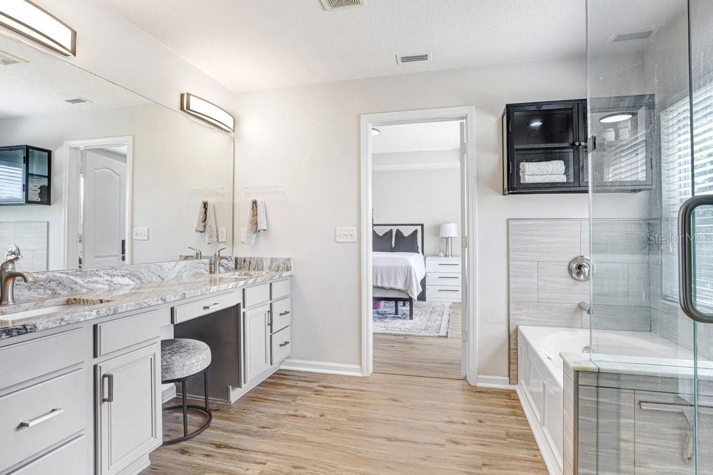 UPDATED Primary Bathroom with DOUBLE sinks and marble counters