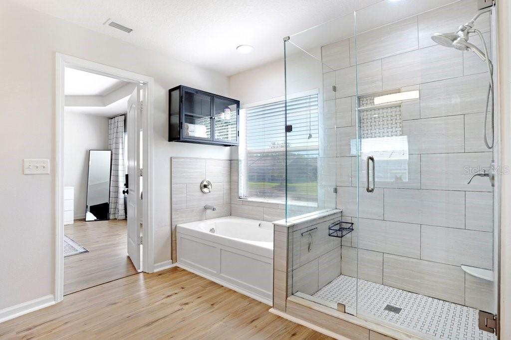 Nice soaking tub and walk in shower