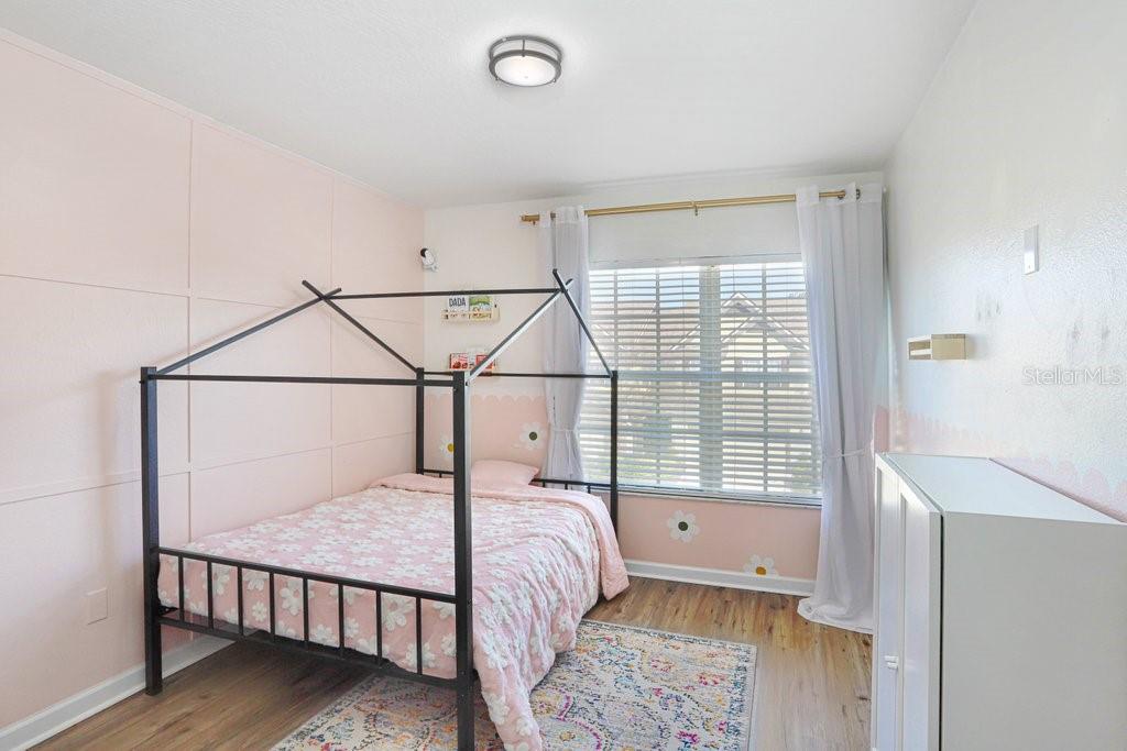 Bedroom 2 with wall feature