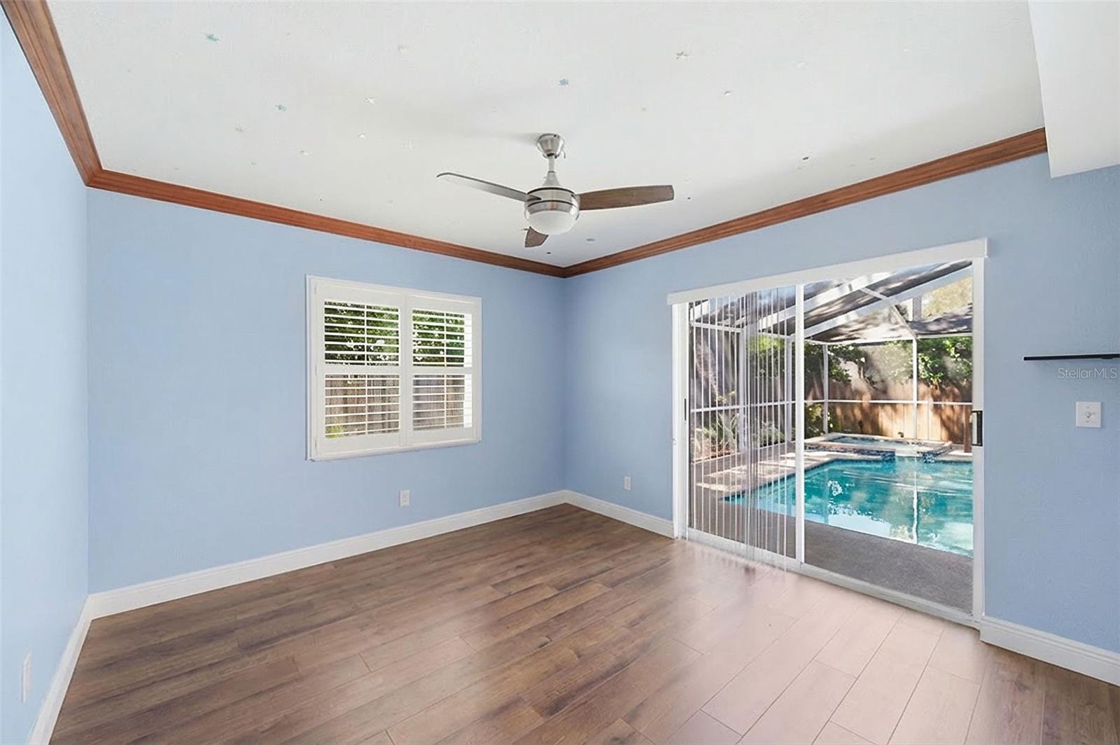 Bedroom 3, sliders to the pool