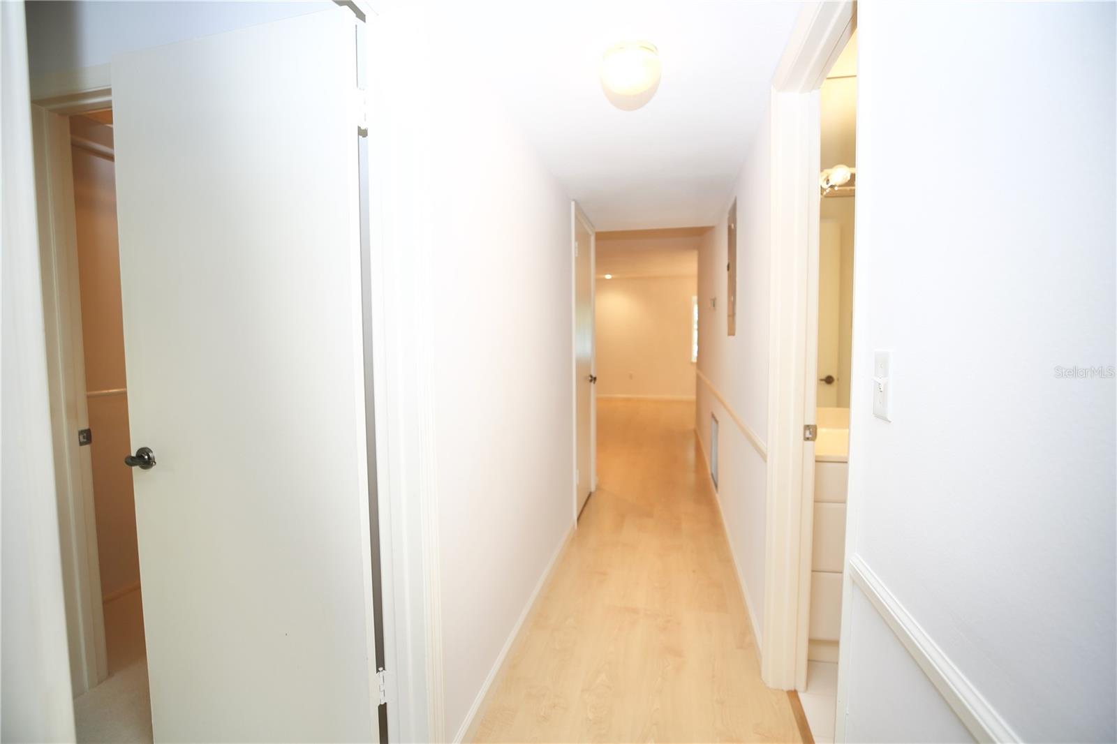 Hallway from bedrooms leading to living area