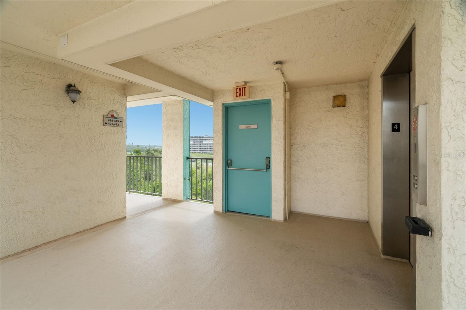 Steps to the Elevator from unit #414!