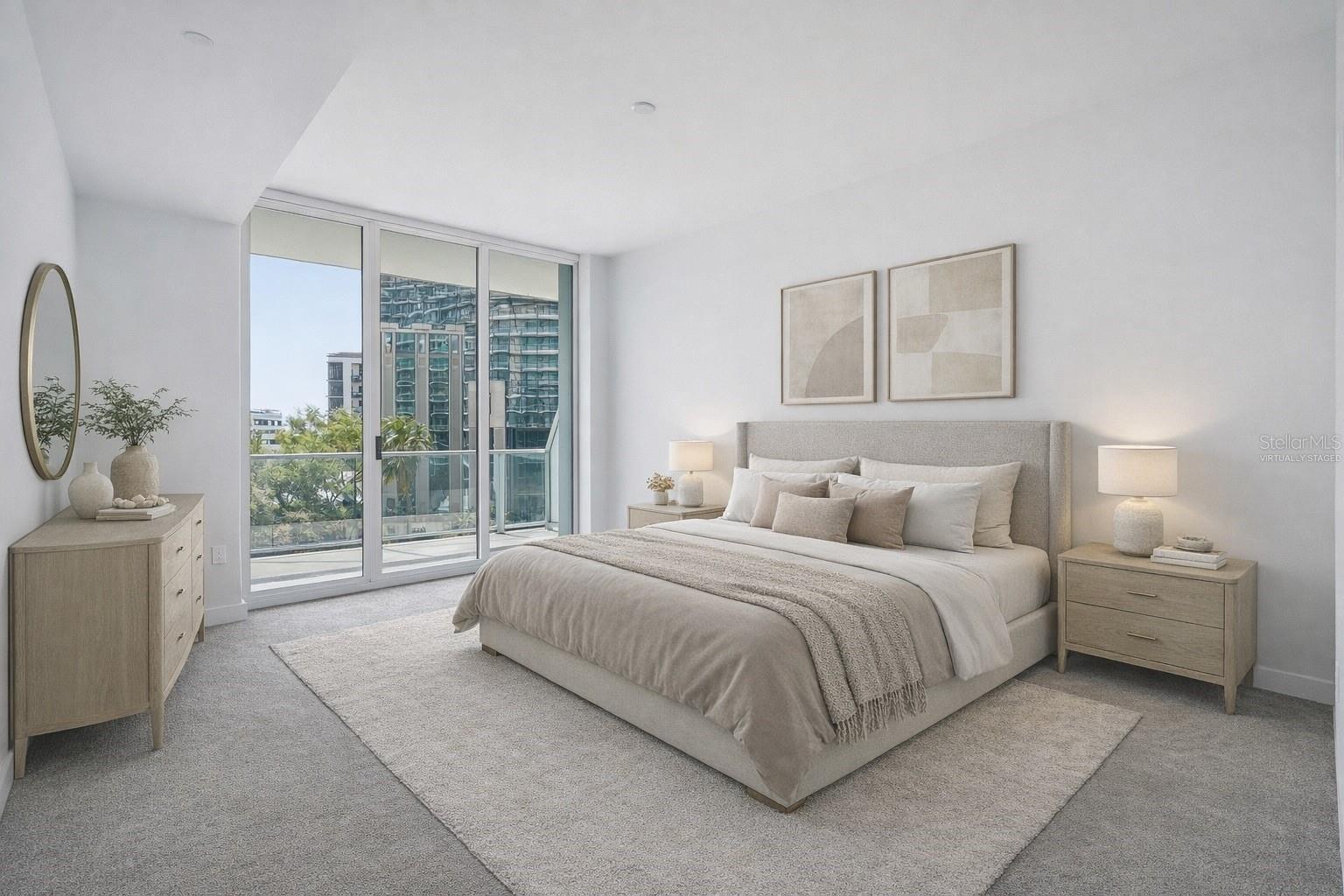 Virtually staged, the primary bedroom has its own private balcony on the second floor