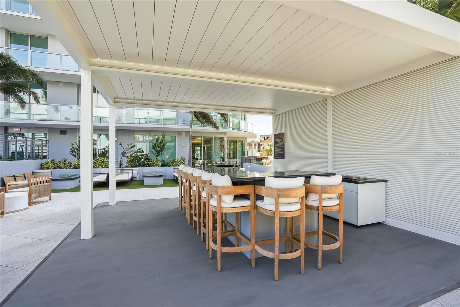 Super cool bar with for outdoor barbecue fun near the pool