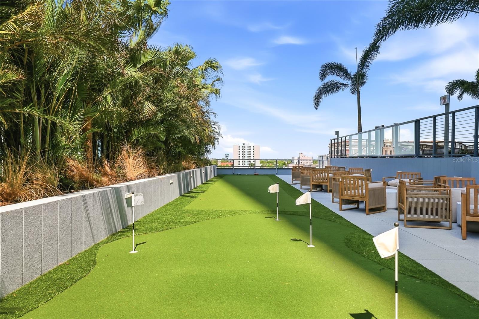 Play games of putt putt golf or bocce ball near the conversation seating area