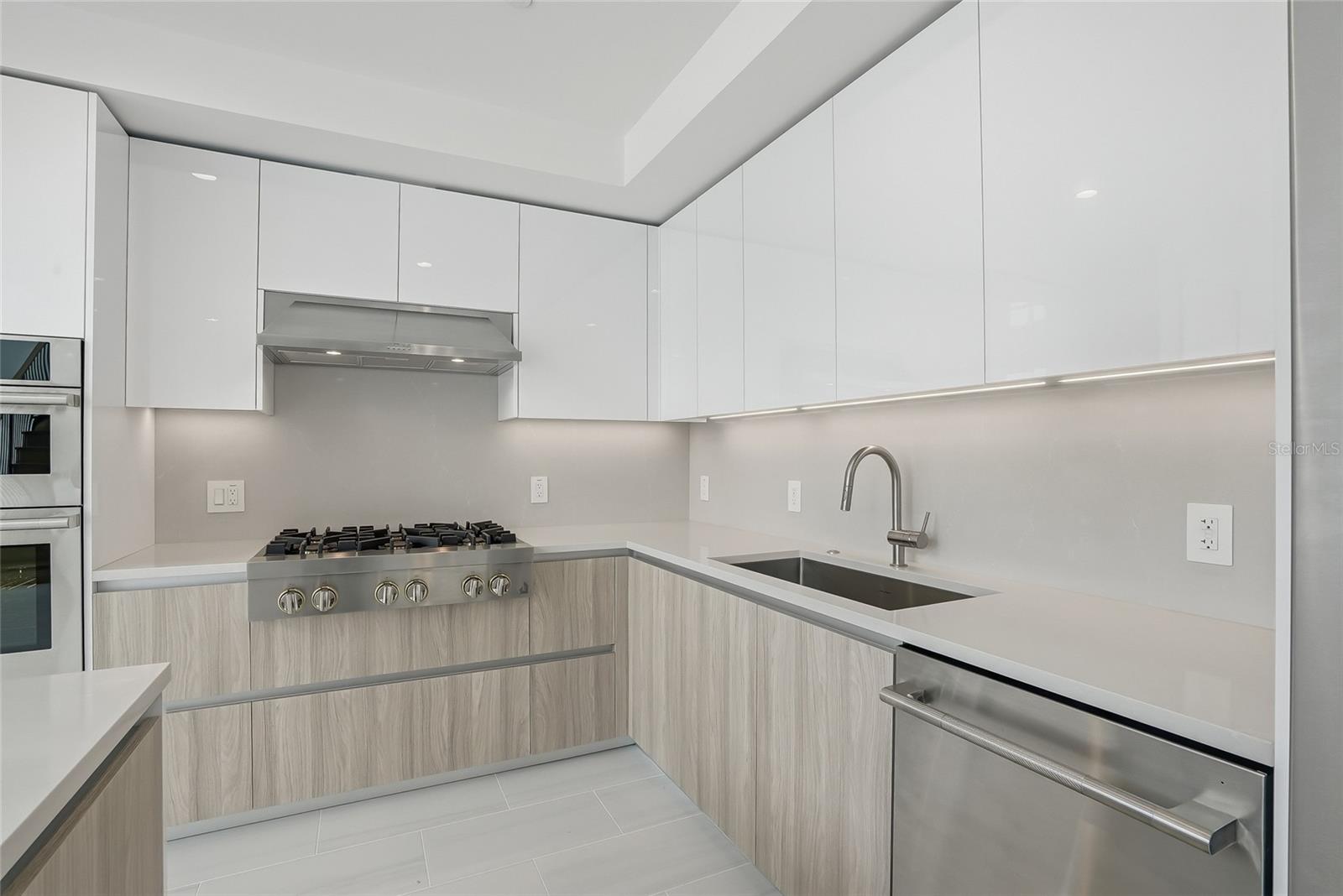 Plenty of counter space for cooking.  Stainless Steel Farmhouse sink.