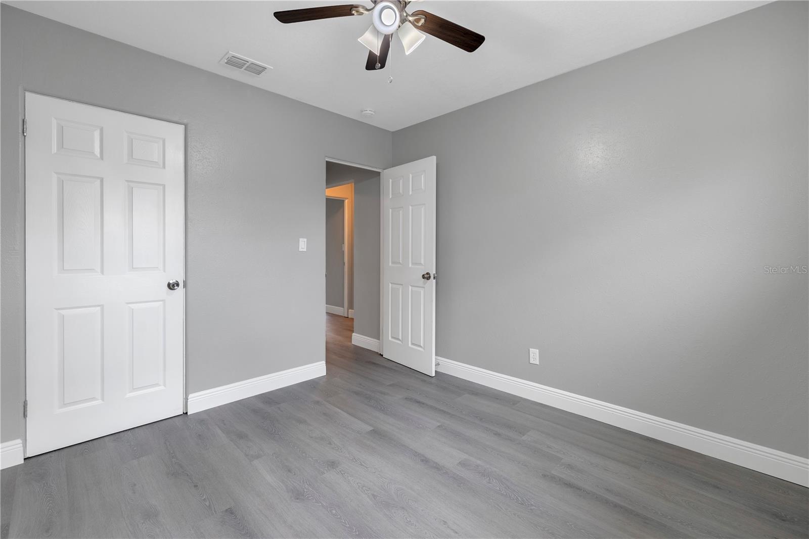 Primary bedroom with walk in closet