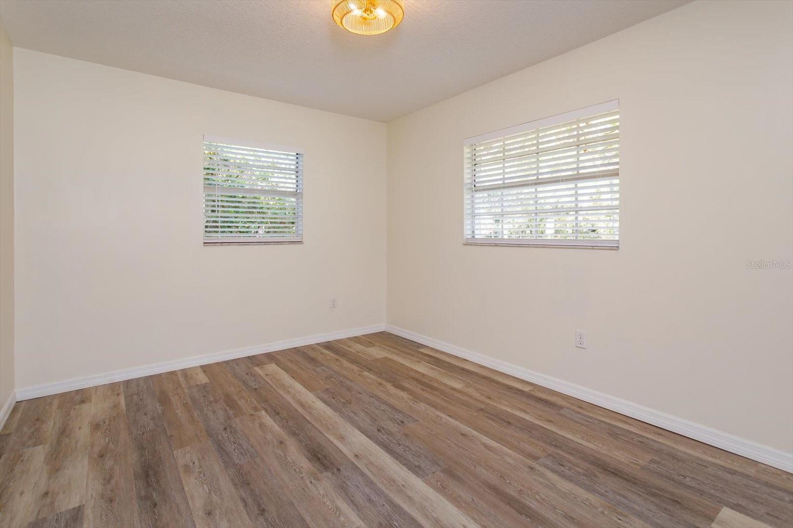 2nd Bedroom. Ceiling fan and new blinds.