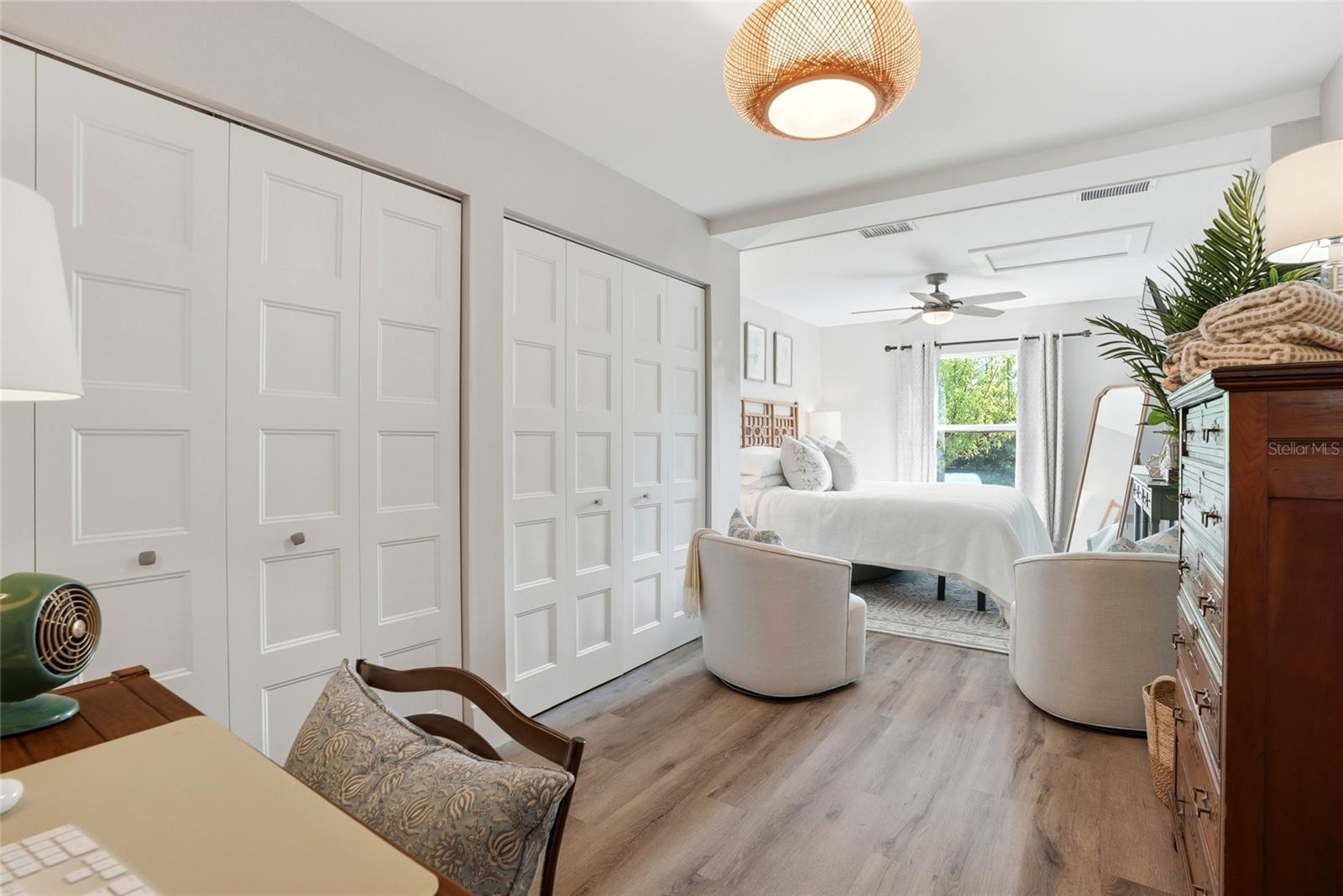 Bedroom two with plenty of living and seating space.