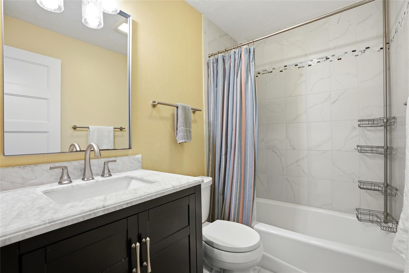 Bathroom two that is off of the living space in between the bedrooms.