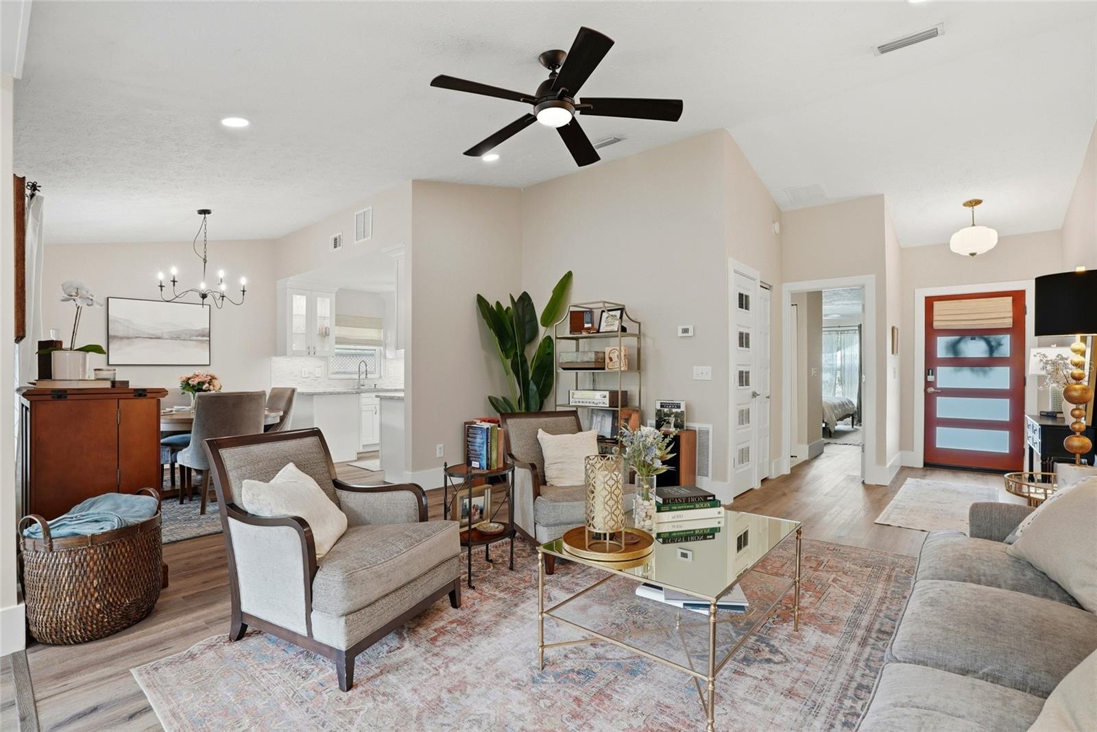 Lots of natural light in the living space from the front door and back patio enters the space.