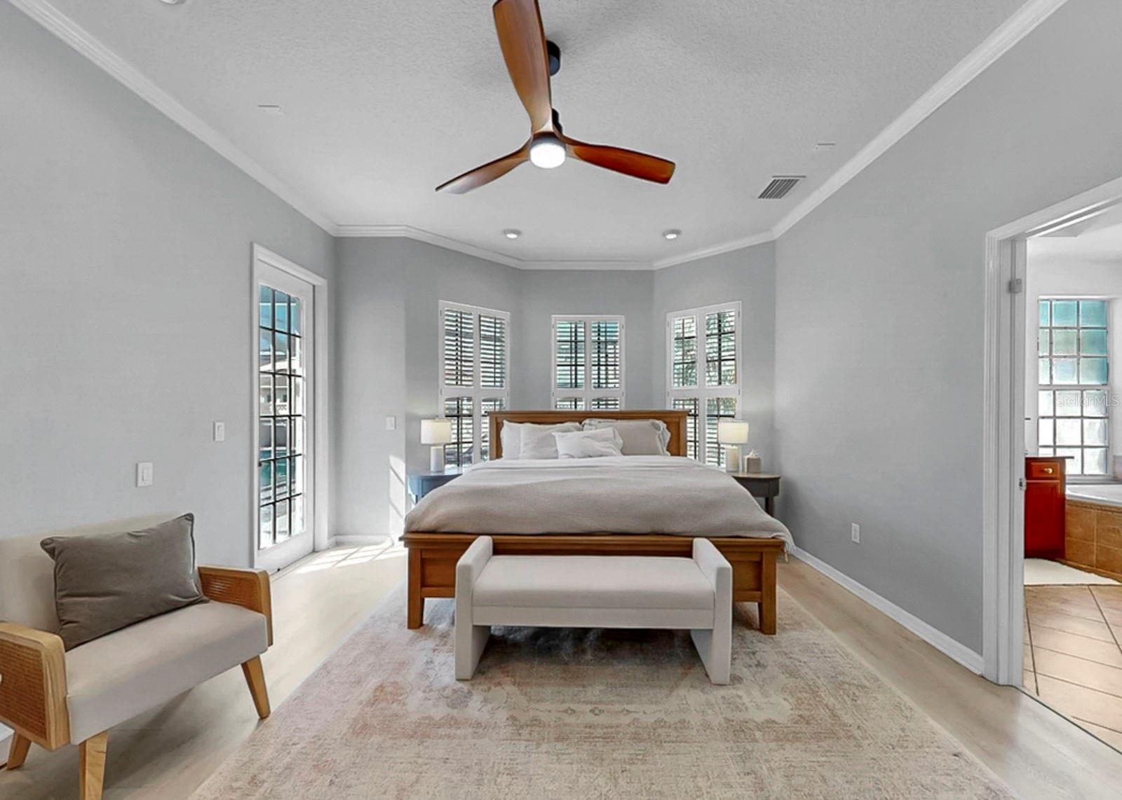 Primary bedroom with pool/lanai access