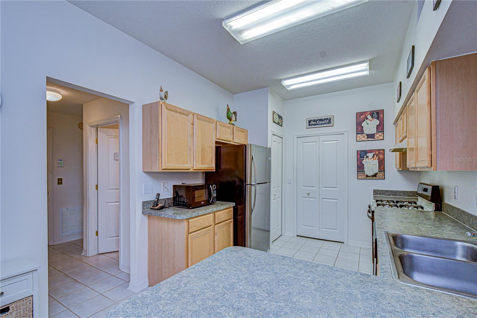 The hallway on the left leads to the 2nd bedroom suite area.