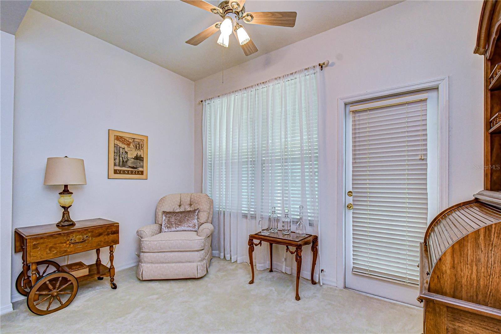 The door leads to a beautiful extended screened, and covered lanai!