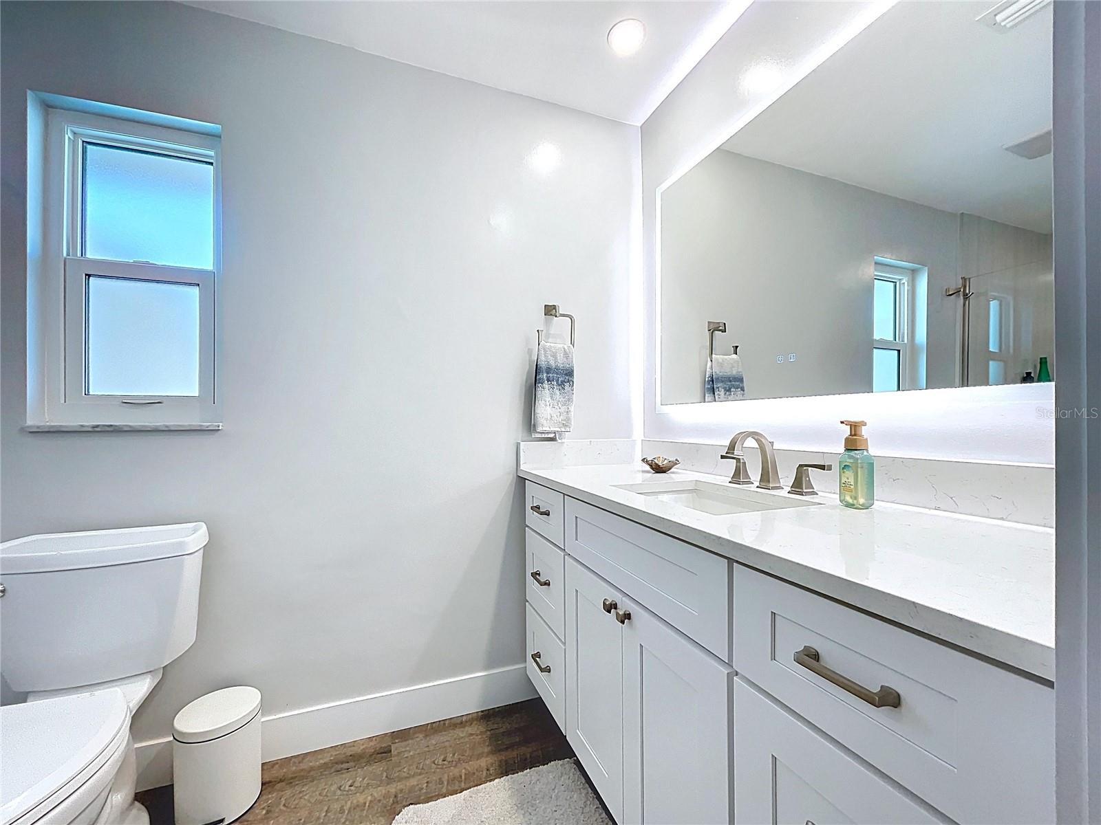 Beautifully remolded ensuite bathroom.
