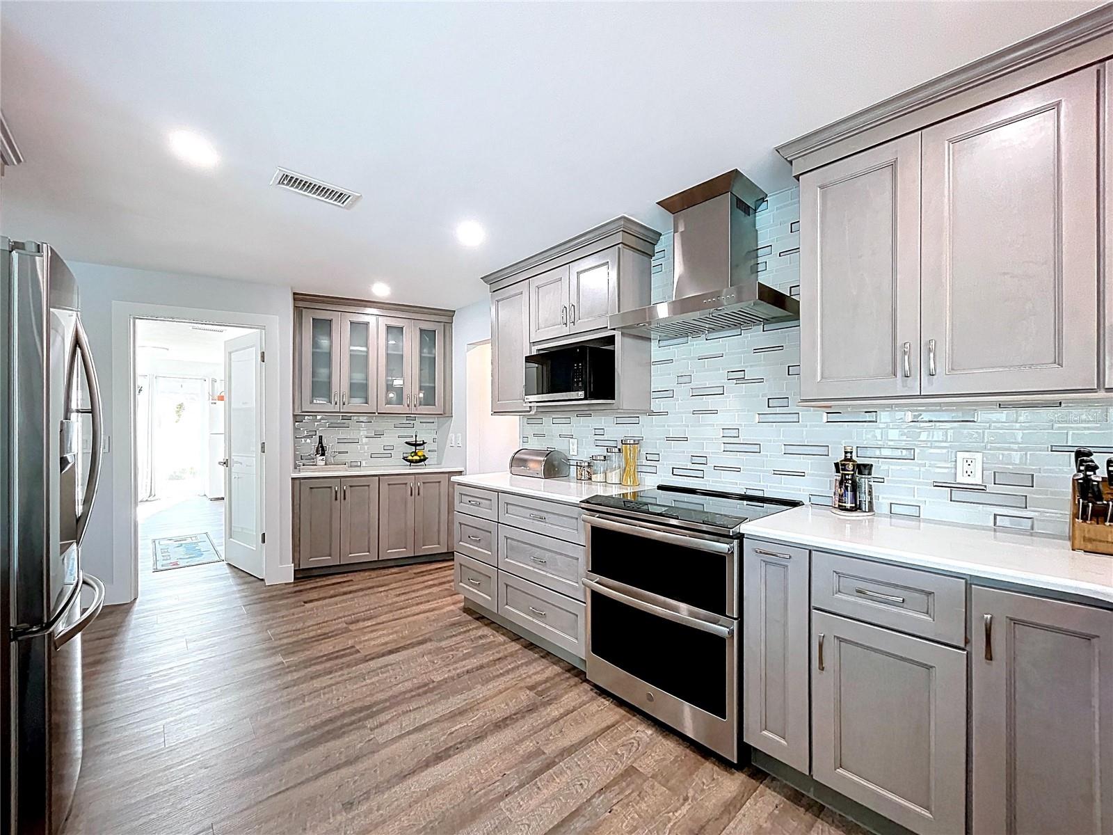 Fully updated kitchen with quartz countertops.