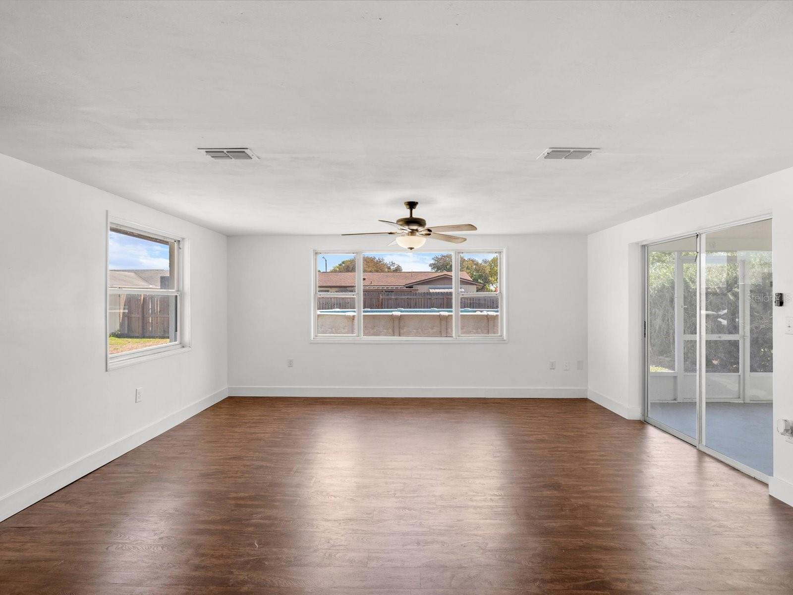 FAMILY ROOM LOOKING OUT TO YARD