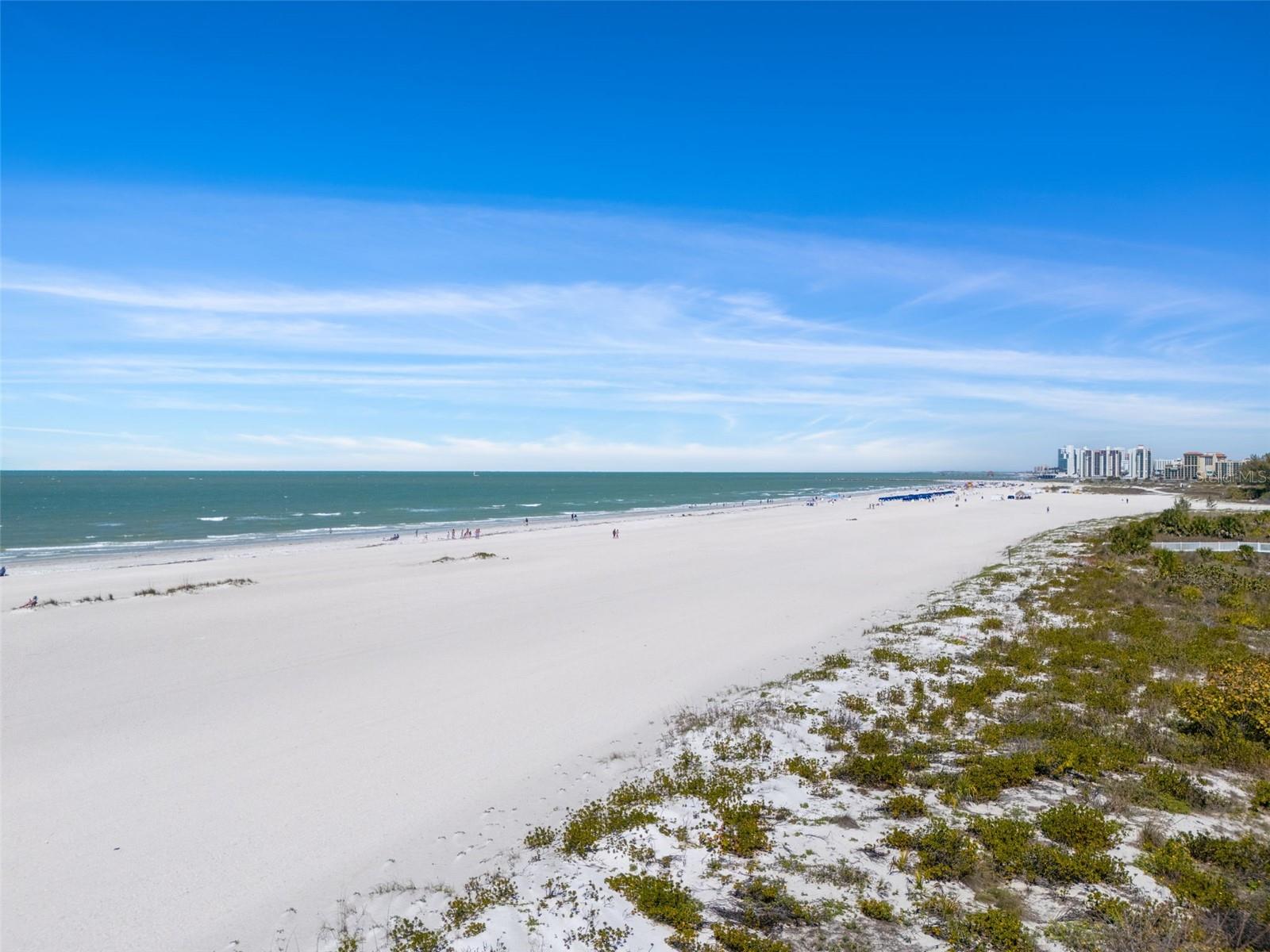 View to the north. Just past the boat channel is Clearwater Beach.  Sand Key features mostly residents and is less crowded than the more commercialized Clearwater Beach.