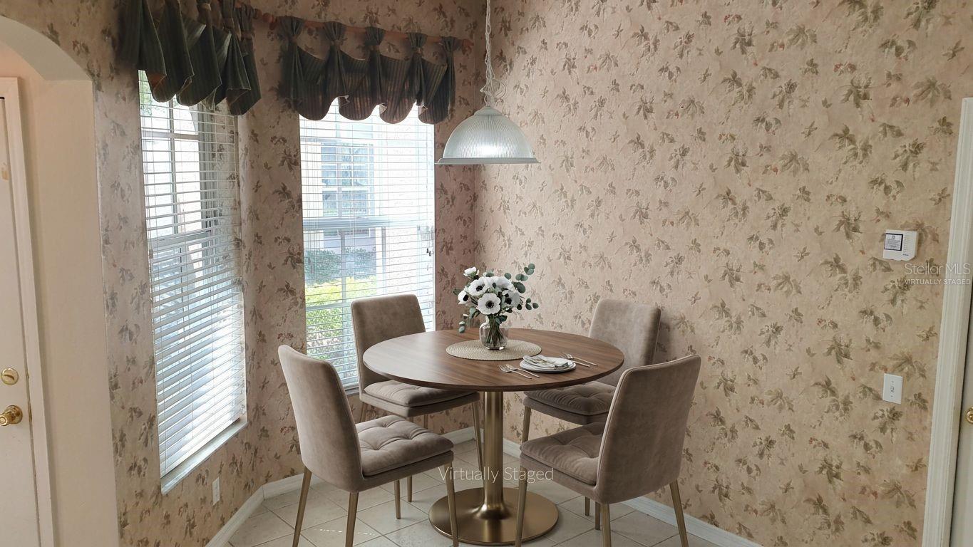 Breakfast nook in kitchen - Virtually Staged